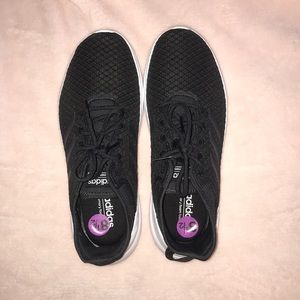 Women’s black addidas sneakers
